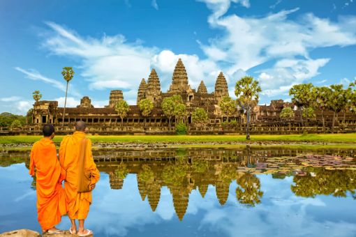 Buddhist monks looking at Ankor Wat